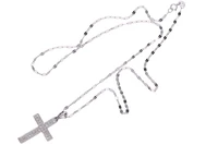 Collana e pendente a forma di croce con diamanti - Asta Preziosi