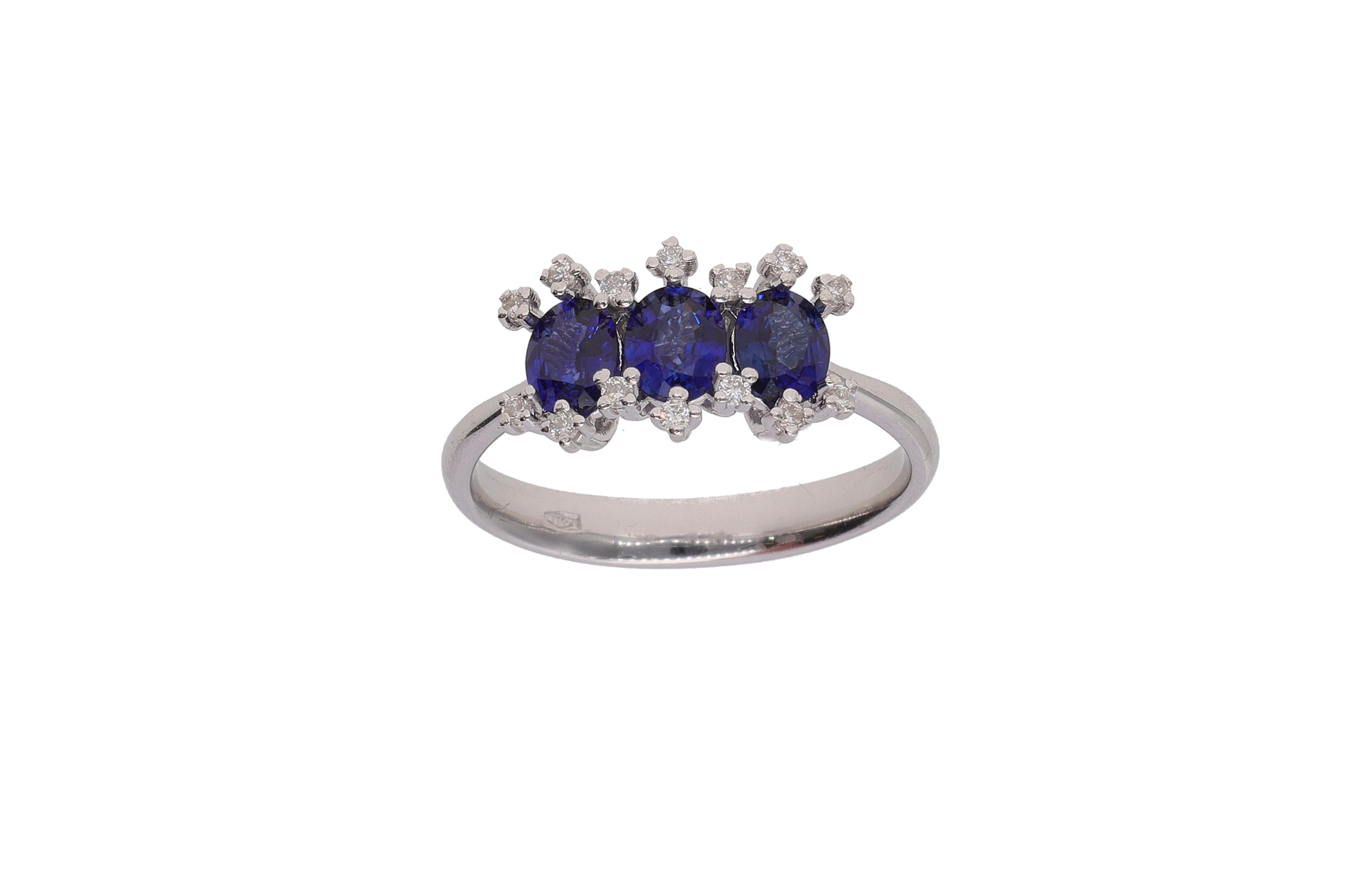 Anello con diamanti e pietre blu - Asta Preziosi