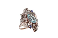 Anello con pietra azzurra, zaffiri e diamanti - Asta Preziosi Anello con pietra azzurra, zaffiri e diamanti - Asta Preziosi