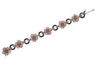 Bracciale con corallo, onice, rubini e diamanti - Asta Preziosi Bracciale con corallo, onice, rubini e diamanti - Asta Preziosi
