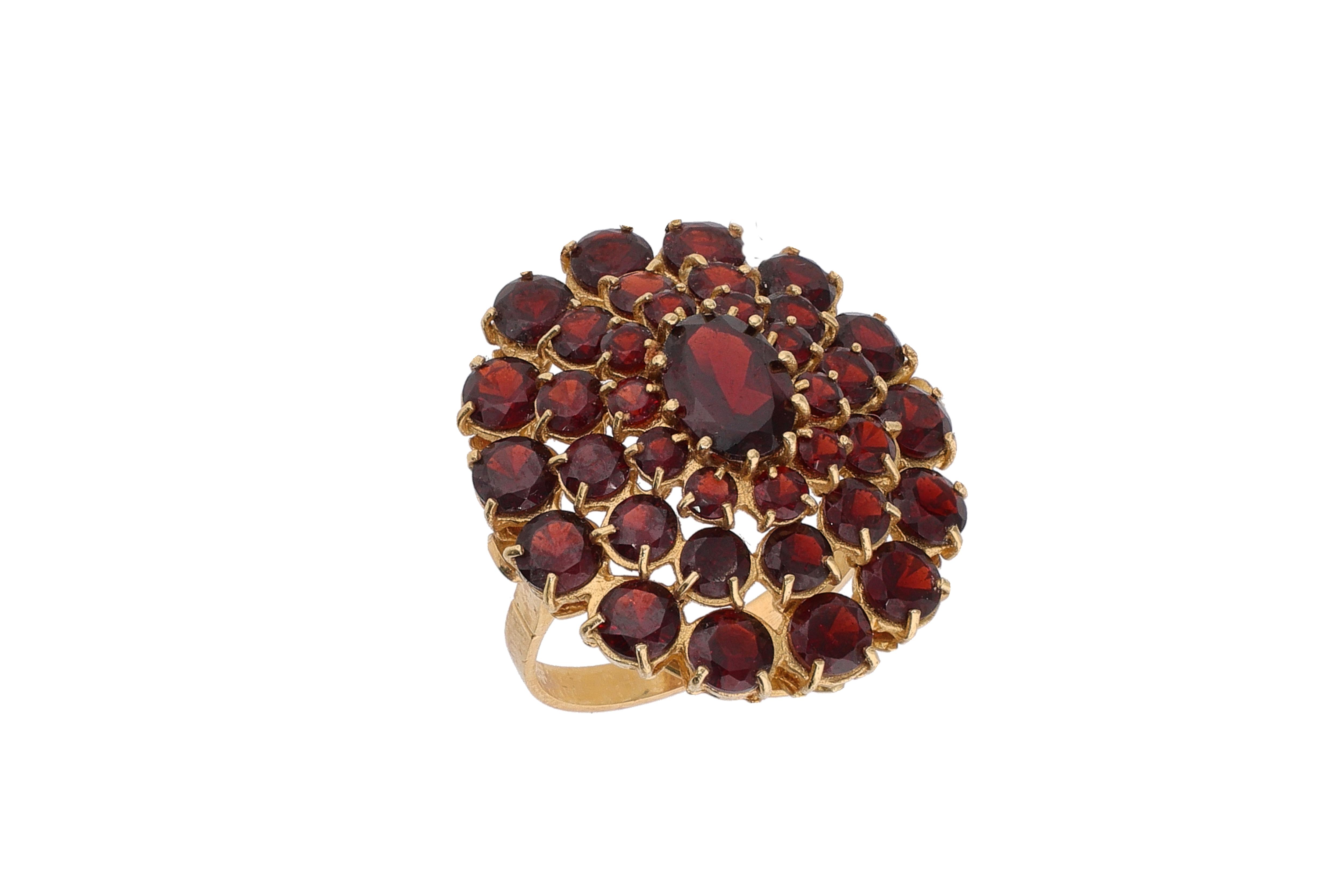 Anello a rosone con granati - Asta Preziosi