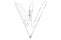 Collier e punto luce con piccolo diamante - Asta Preziosi