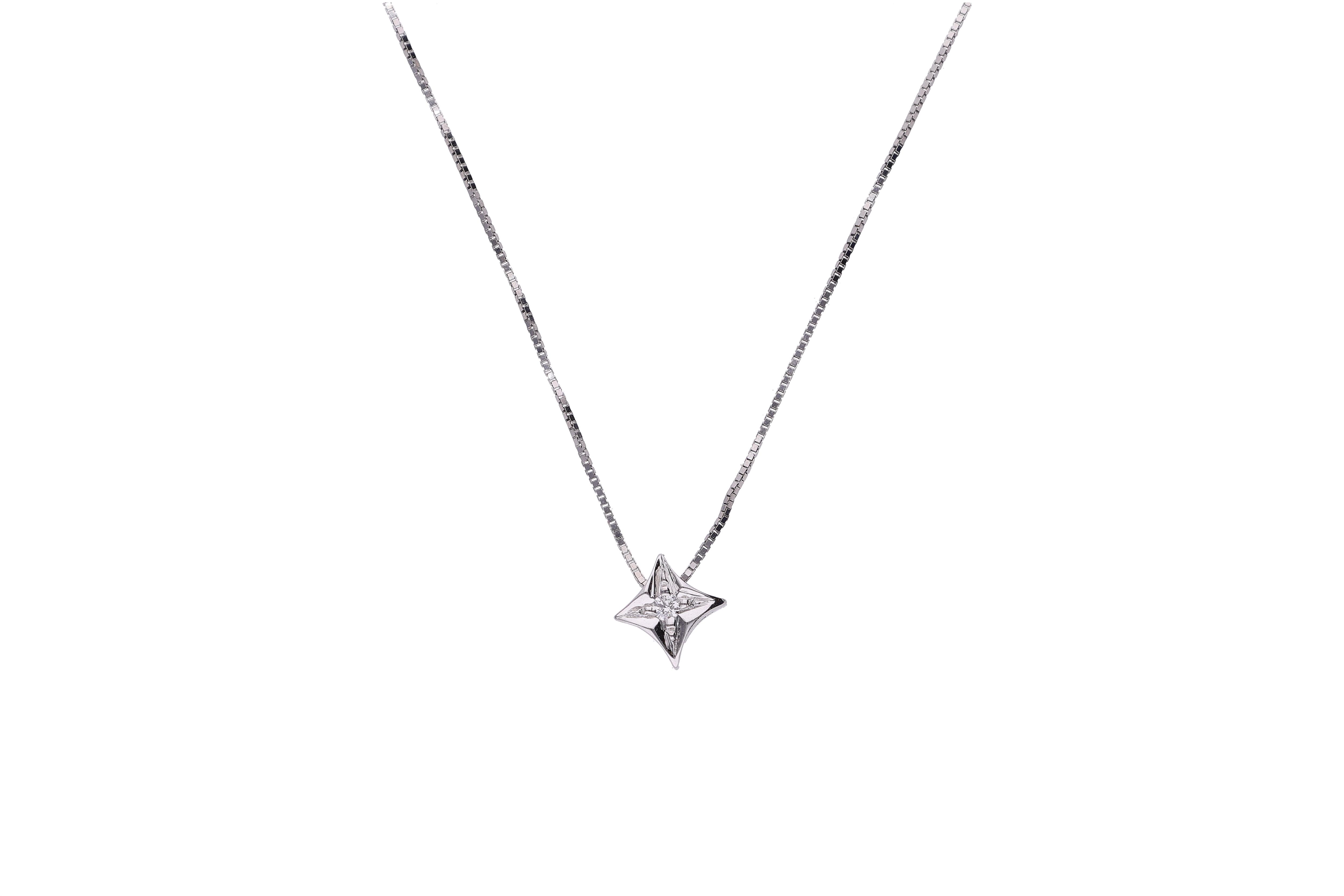 Collier e punto luce con piccolo diamante - Asta Preziosi