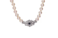 Collana di perle coltivate con zaffiro e diamanti - Asta Preziosi Collana di perle coltivate con zaffiro e diamanti - Asta Preziosi