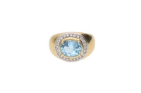Anello con diamanti e topazio azzurro - Asta Preziosi Anello con diamanti e topazio azzurro - Asta Preziosi