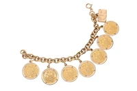 Bracciale con monete e ciondolo - Asta Preziosi Bracciale con monete e ciondolo - Asta Preziosi