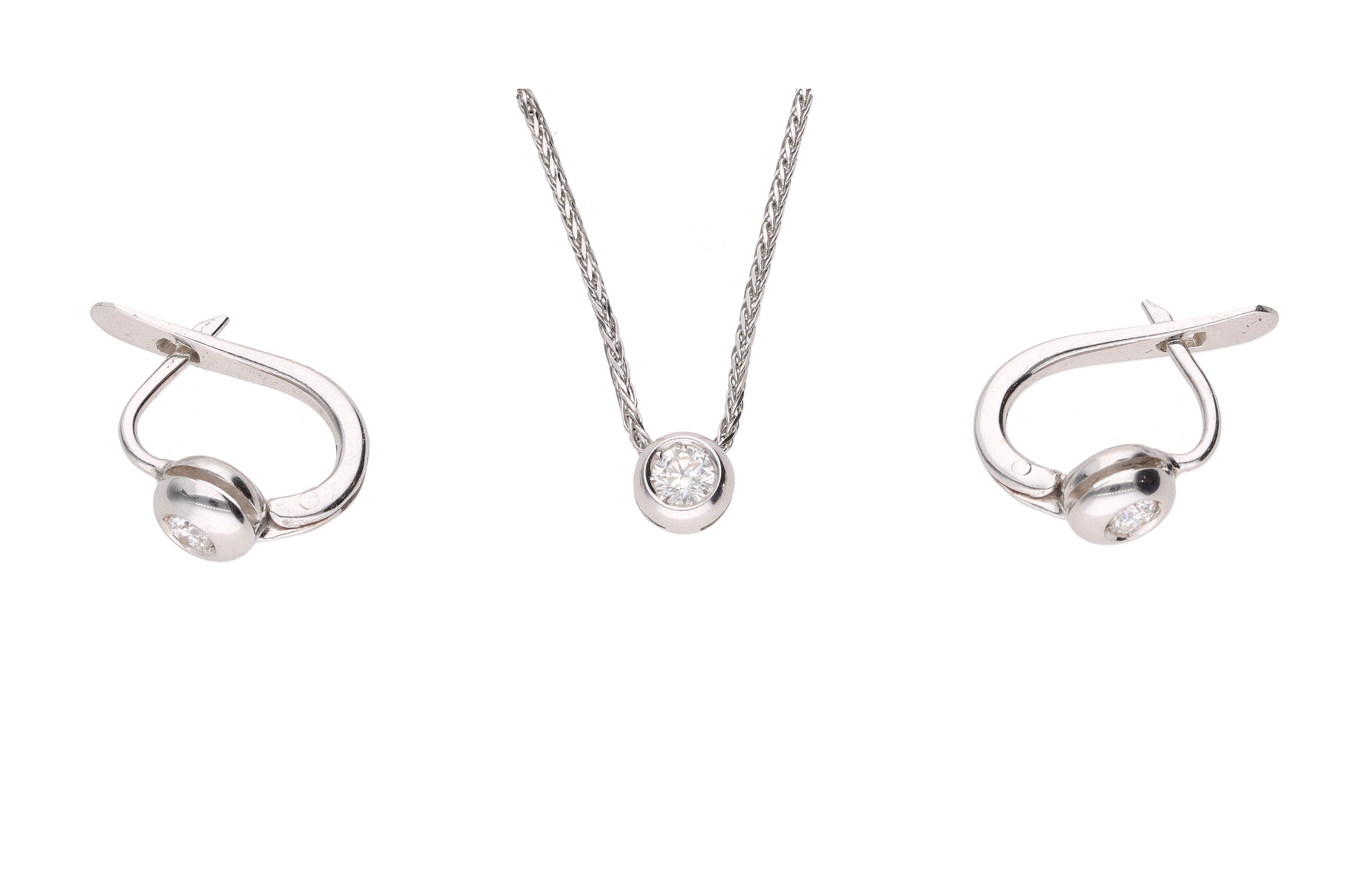 Collier e orecchini con diamanti - Asta Preziosi