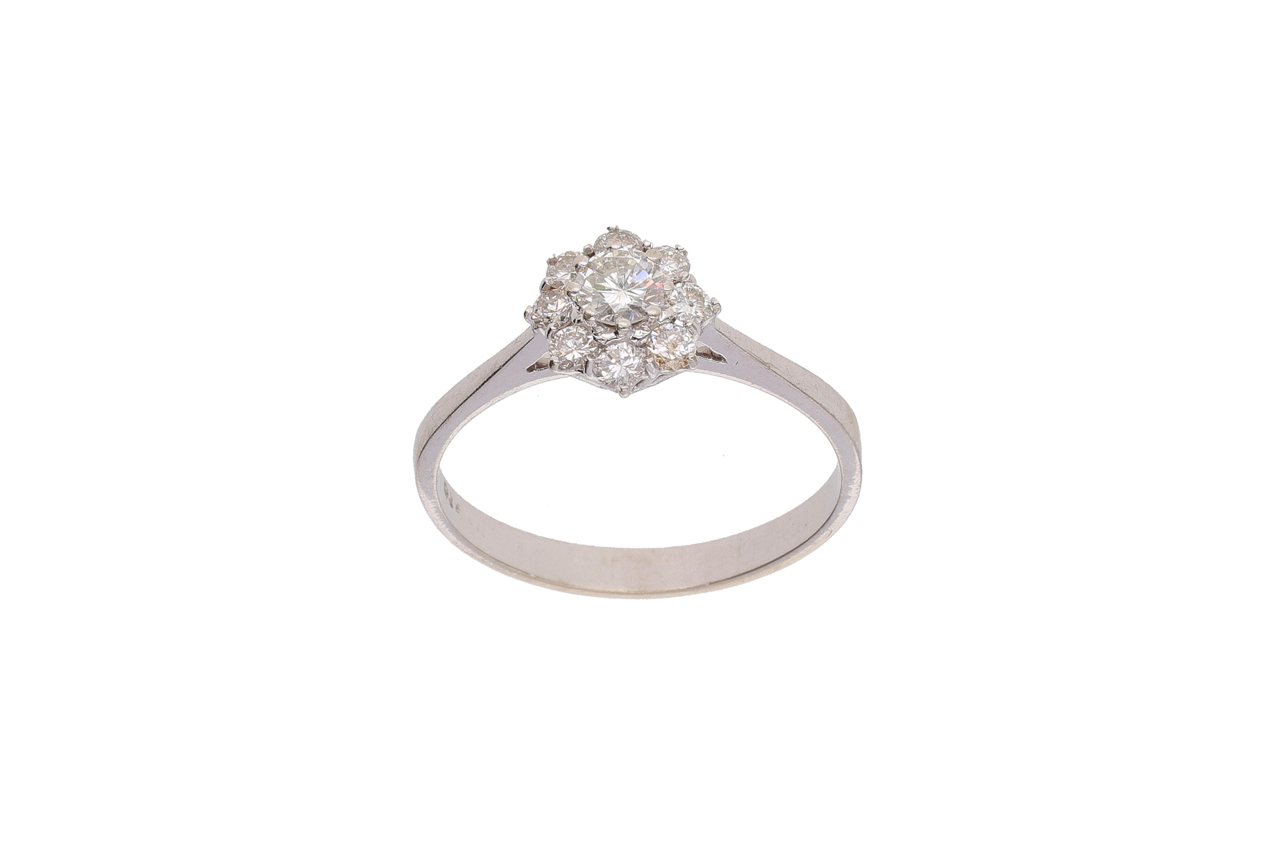 Anello a margherita con diamanti - Asta Preziosi