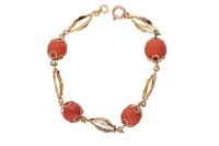 Bracciale con sfere di corallo - Asta Preziosi Bracciale con sfere di corallo - Asta Preziosi
