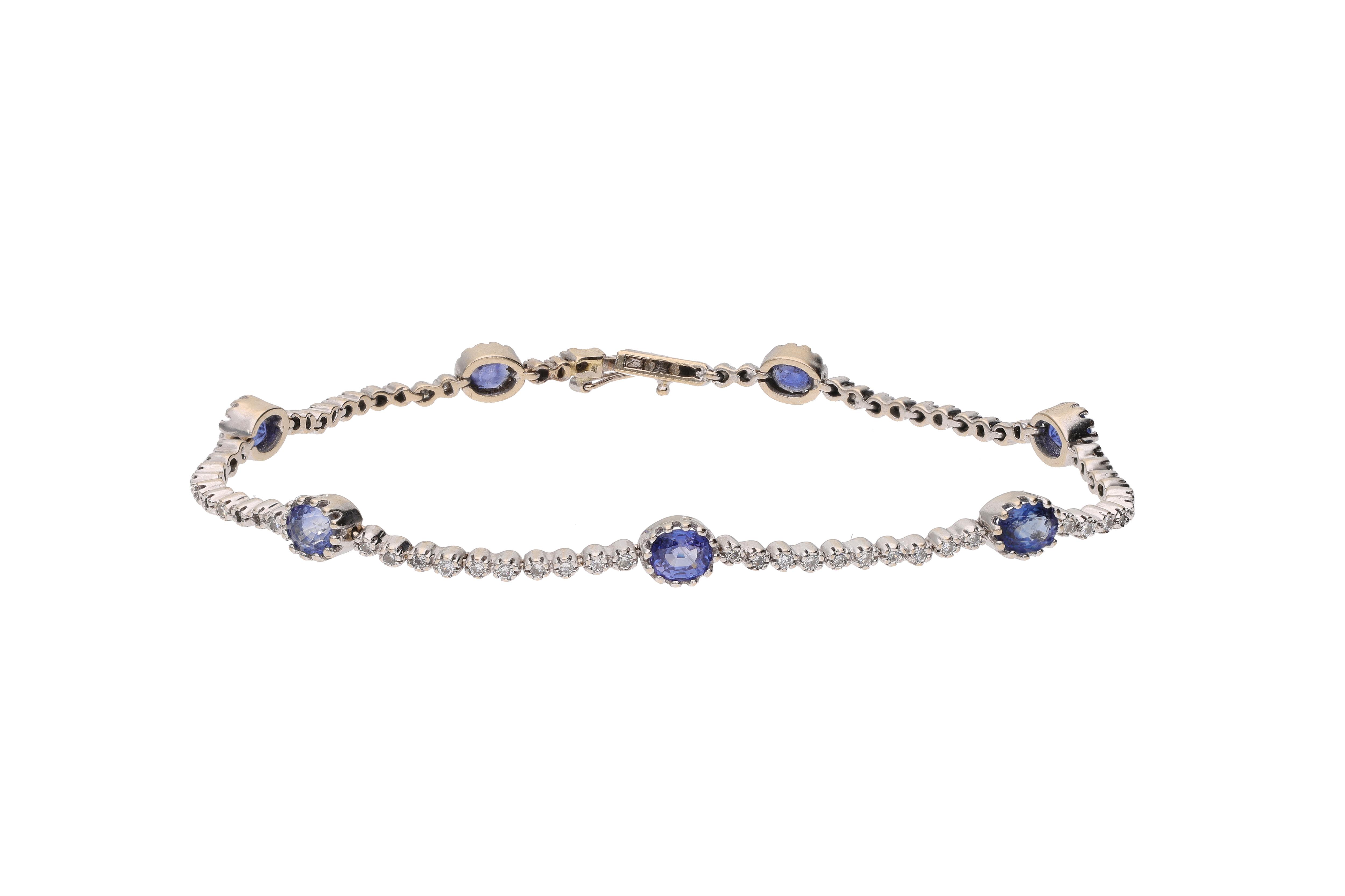 Bracciale con diamanti e pietre blu - Asta Preziosi