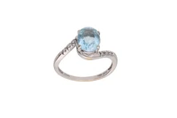 Miluna, anello con diamanti e topazio azzurro - Asta Preziosi Miluna, anello con diamanti e topazio azzurro - Asta Preziosi