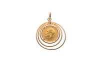 Ciondolo con sterlina inglese - Asta Preziosi