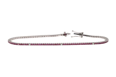 Bracciale tennis con pietre rosse e piccoli diamanti - Asta Preziosi