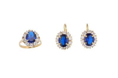 Demi parure composta da anello e paio di orecchini con pietre - Asta Preziosi