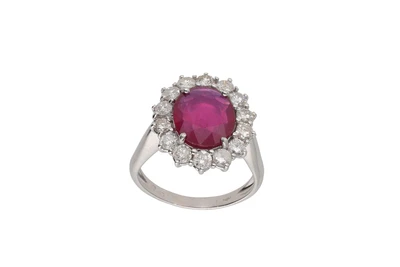 Anello con pietra rossa e diamanti - Asta Preziosi