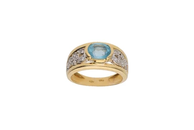 Anello con topazio azzurro e pietre incolore - Asta Preziosi