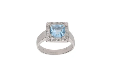 Anello con topazio azzurro e pietre - Asta Preziosi