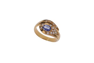 Anello a serpente con diamanti e zaffiro - Asta Preziosi Anello a serpente con diamanti e zaffiro - Asta Preziosi