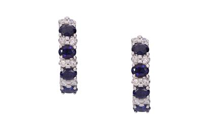 Paio di orecchini con diamanti e pietre blu - Asta Preziosi Paio di orecchini con diamanti e pietre blu - Asta Preziosi