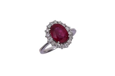Anello con diamanti e pietra rossa - Asta Preziosi