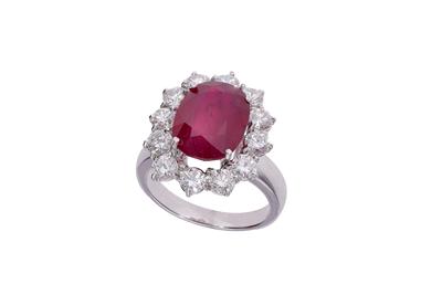 Anello a margherita con diamanti e pietra - Asta Preziosi Anello a margherita con diamanti e pietra - Asta Preziosi
