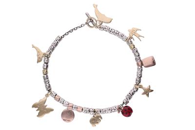Dodo, bracciale in argento e oro giallo 750 - Asta Preziosi