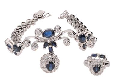Anello e bracciale con diamanti e zaffiri - Asta Preziosi Anello e bracciale con diamanti e zaffiri - Asta Preziosi