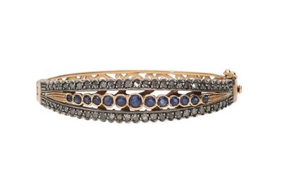 Bracciale rigido con diamanti e zaffiri - Asta Preziosi Bracciale rigido con diamanti e zaffiri - Asta Preziosi