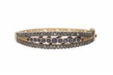 Bracciale rigido con diamanti e zaffiri - Asta Preziosi Bracciale rigido con diamanti e zaffiri - Asta Preziosi