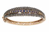 Bracciale rigido con diamanti e zaffiri - Asta Preziosi Bracciale rigido con diamanti e zaffiri - Asta Preziosi