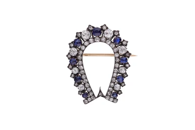Spilla con diamanti, zaffiri e pietre - Vintage mania Spilla con diamanti, zaffiri e pietre - Vintage mania