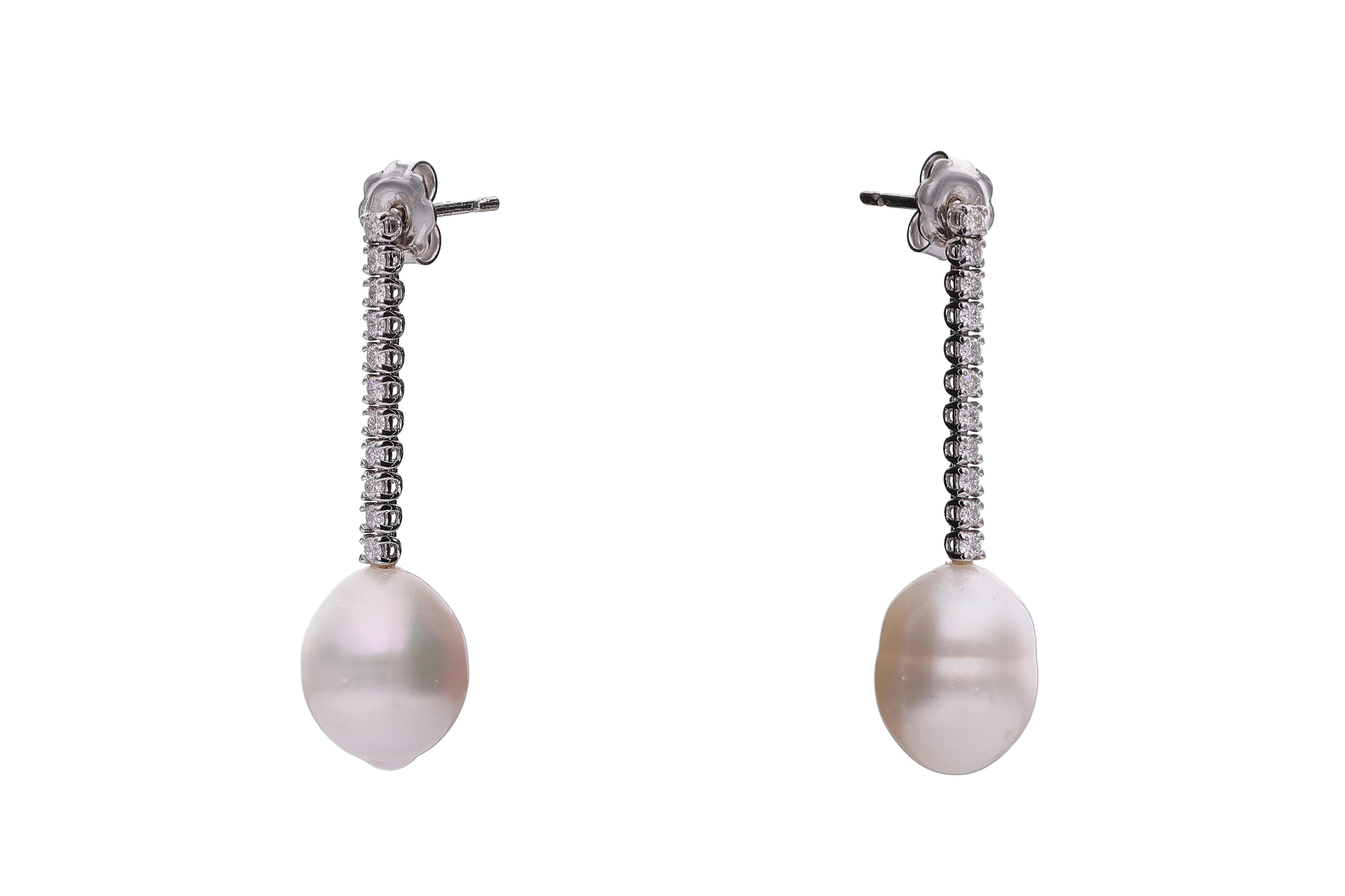 Paio di orecchini con diamanti e perle - Asta Tesori di Pasqua - Gioielli da riscoprire Paio di orecchini con diamanti e perle - Asta Tesori di Pasqua - Gioielli da riscoprire