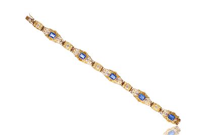 Bracciale in oro e pietre - Asta Preziosi
