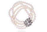 Bracciale composto da 4 fili di perle e chiusura in oro con diamanti - 