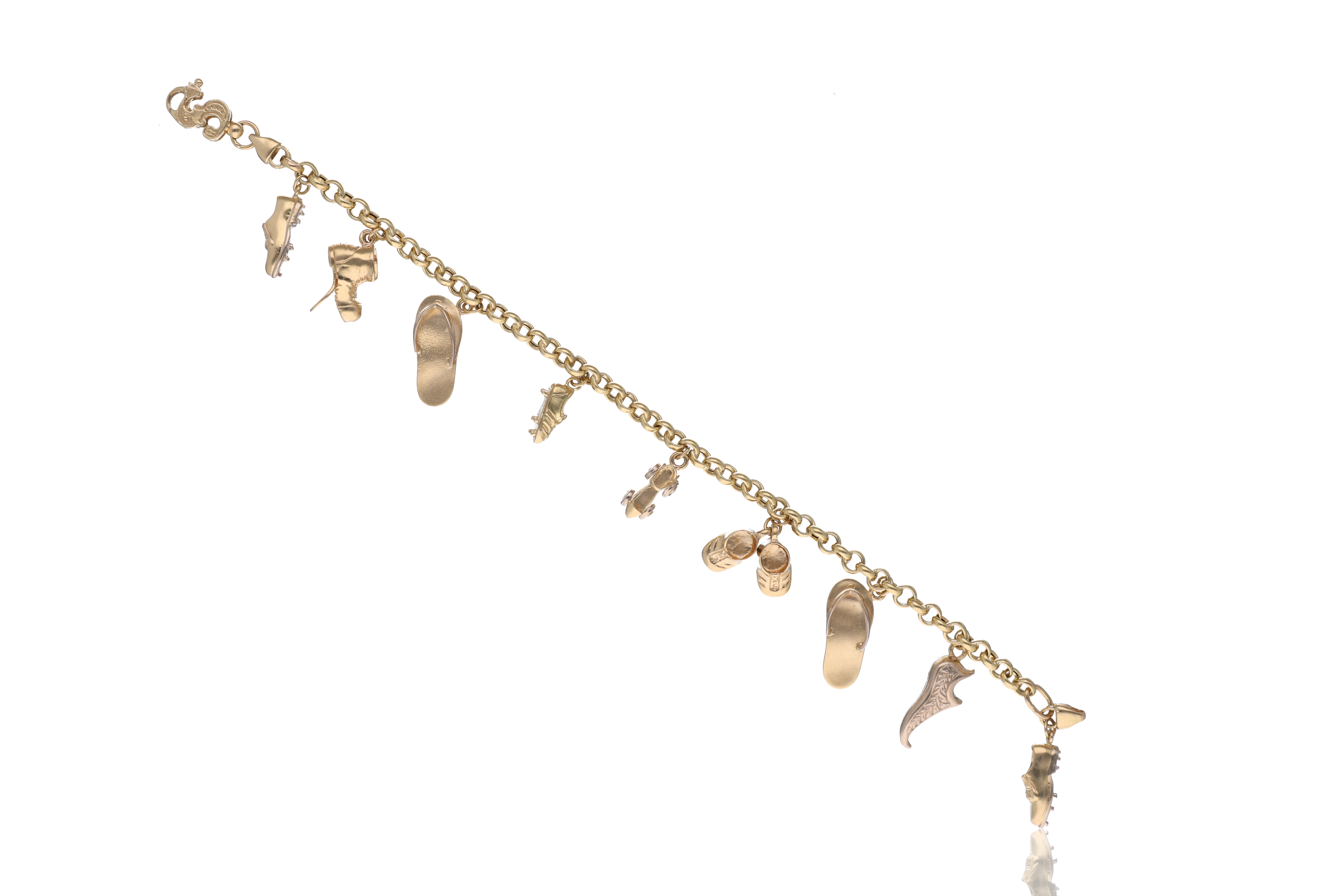 Bracciale con ciondoli, in oro - Asta Preziosi