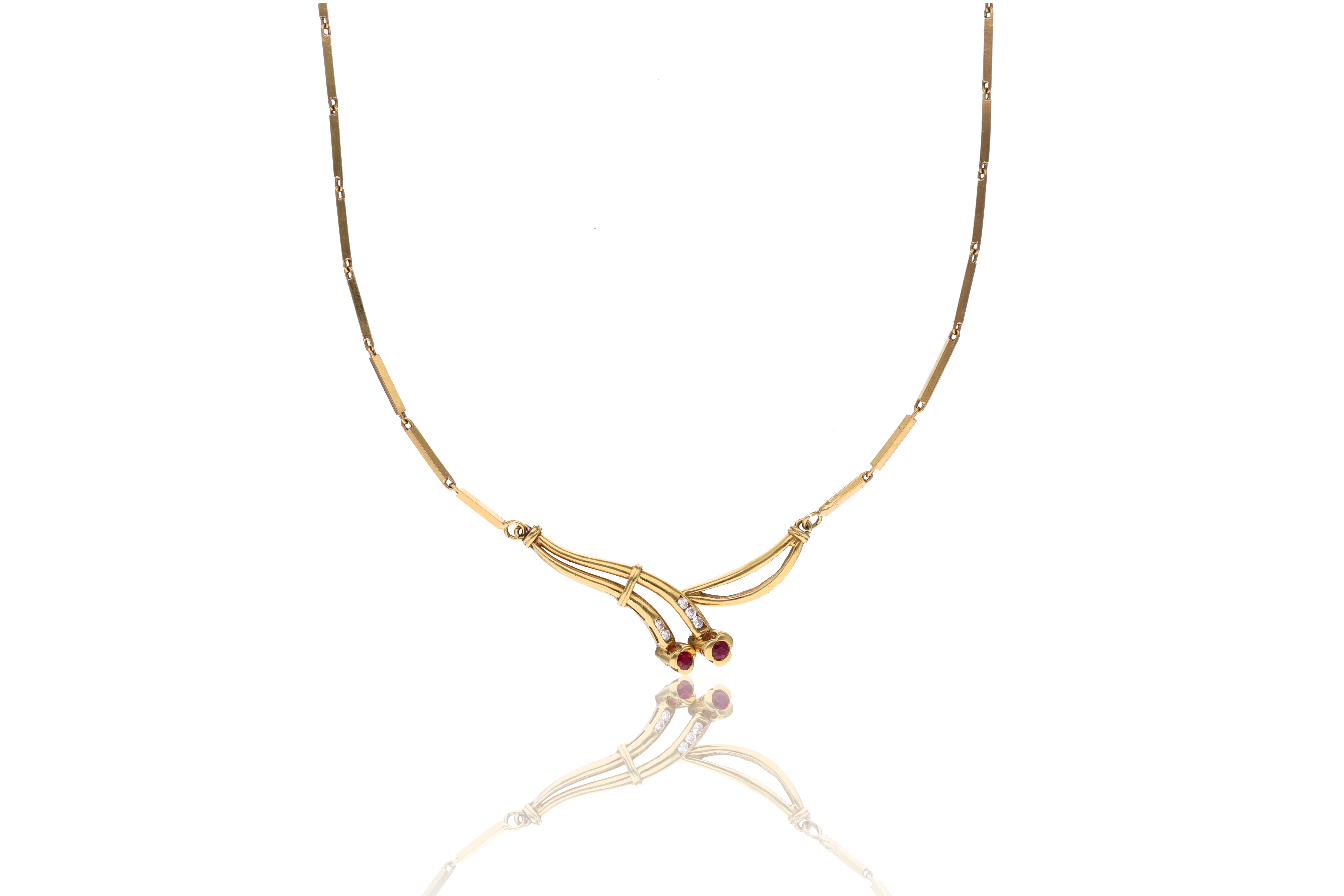 Collana in oro, con diamanti e rubini - Asta Preziosi