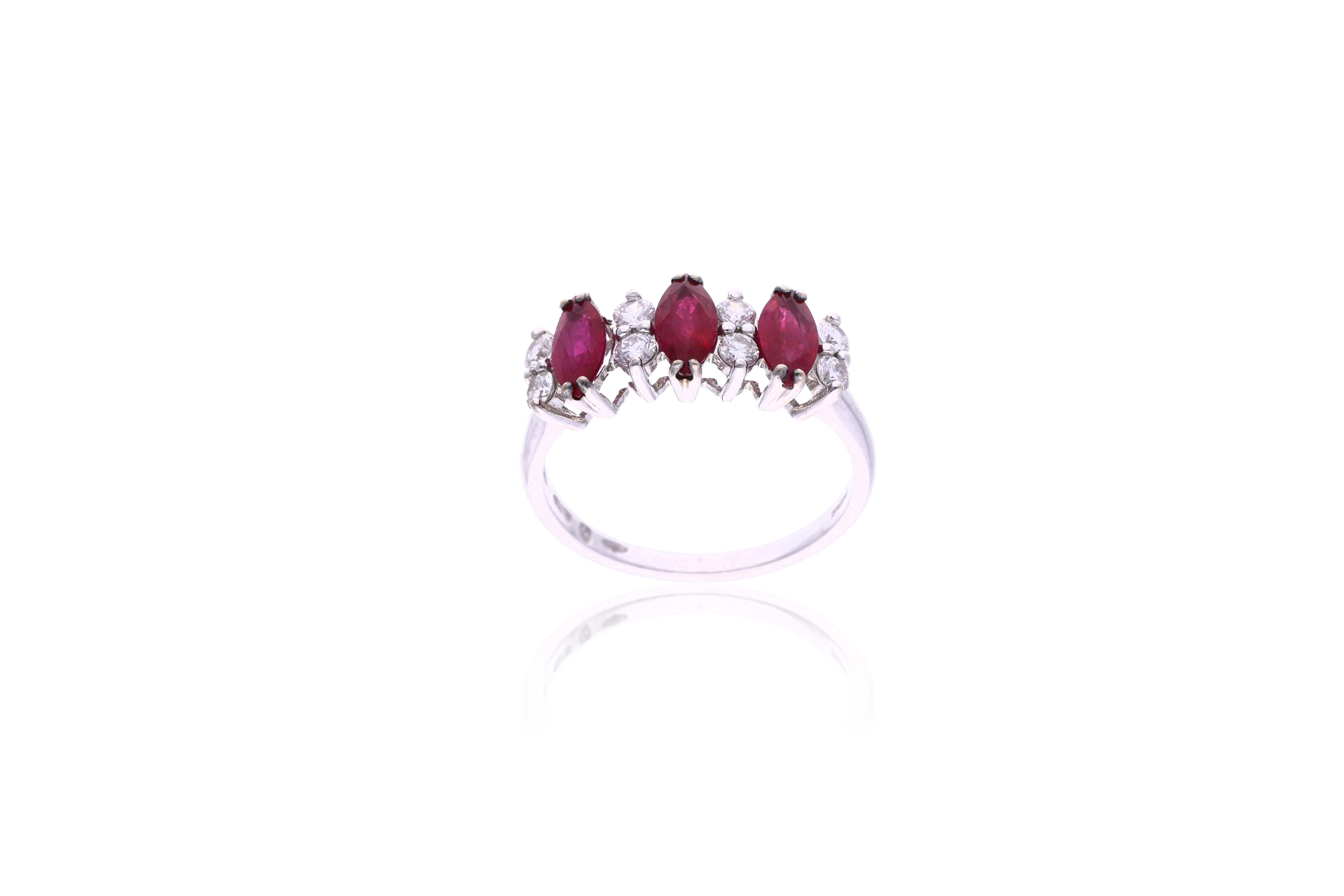 Damiani, anello trilogy con rubini e diamanti - Asta Preziosi