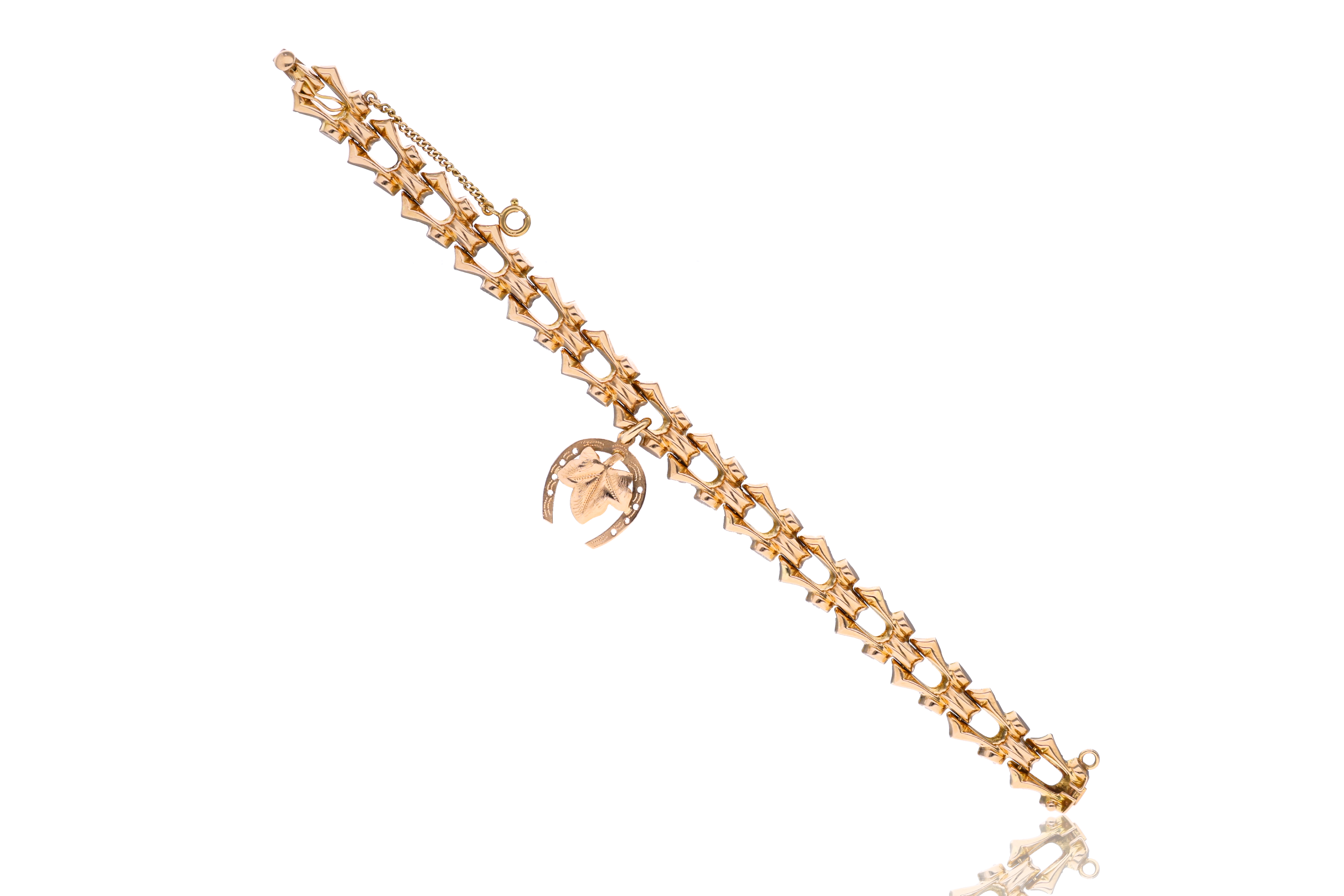 Bracciale con ciondolo in oro - Asta Preziosi