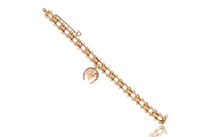 Bracciale con ciondolo in oro - Asta Preziosi