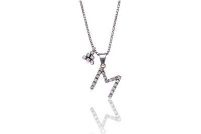 Collana, due ciondoli in oro, con diamanti - Asta Preziosi Collana, due ciondoli in oro, con diamanti - Asta Preziosi