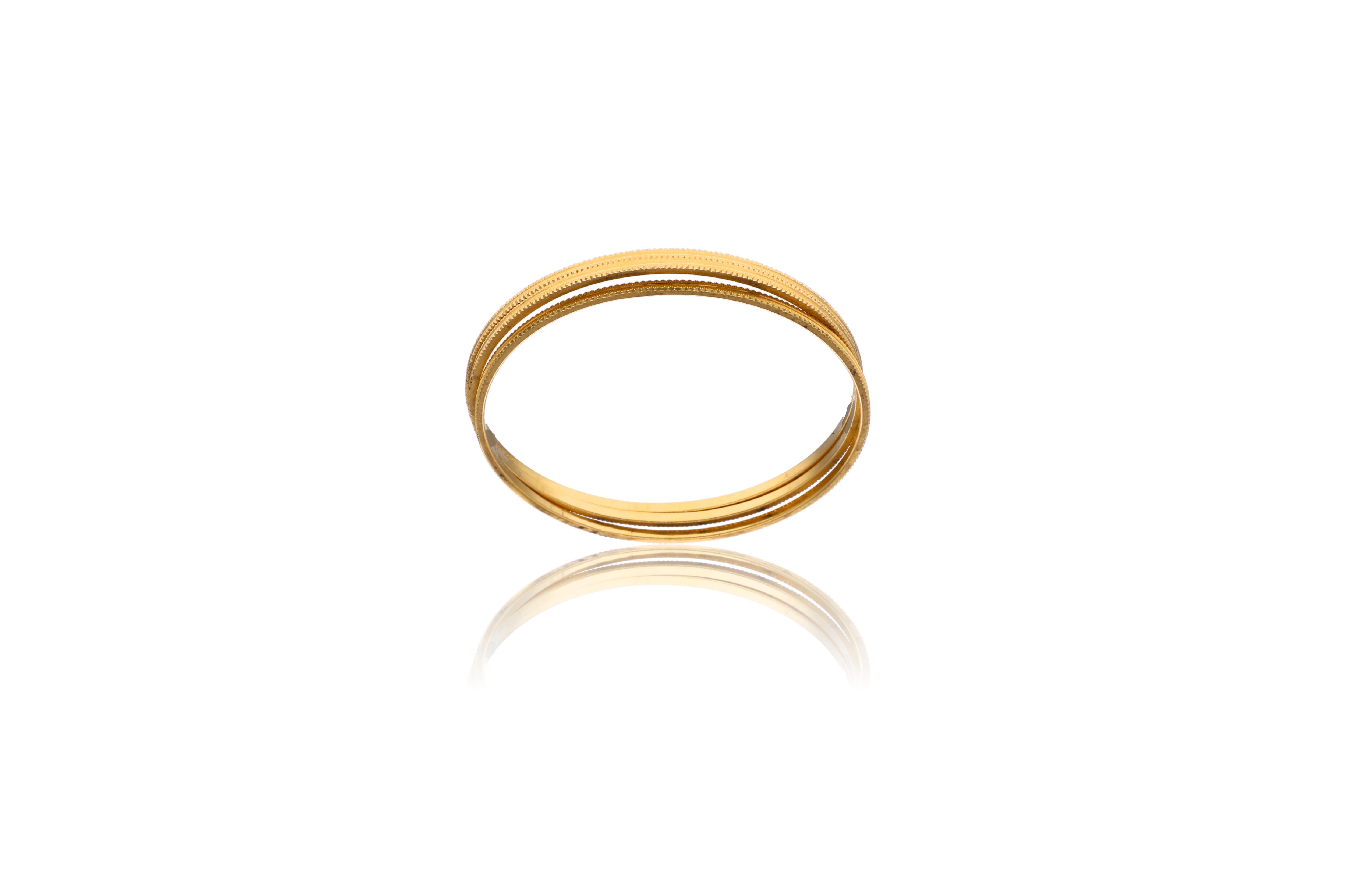 Tre bracciali in oro - Asta Preziosi