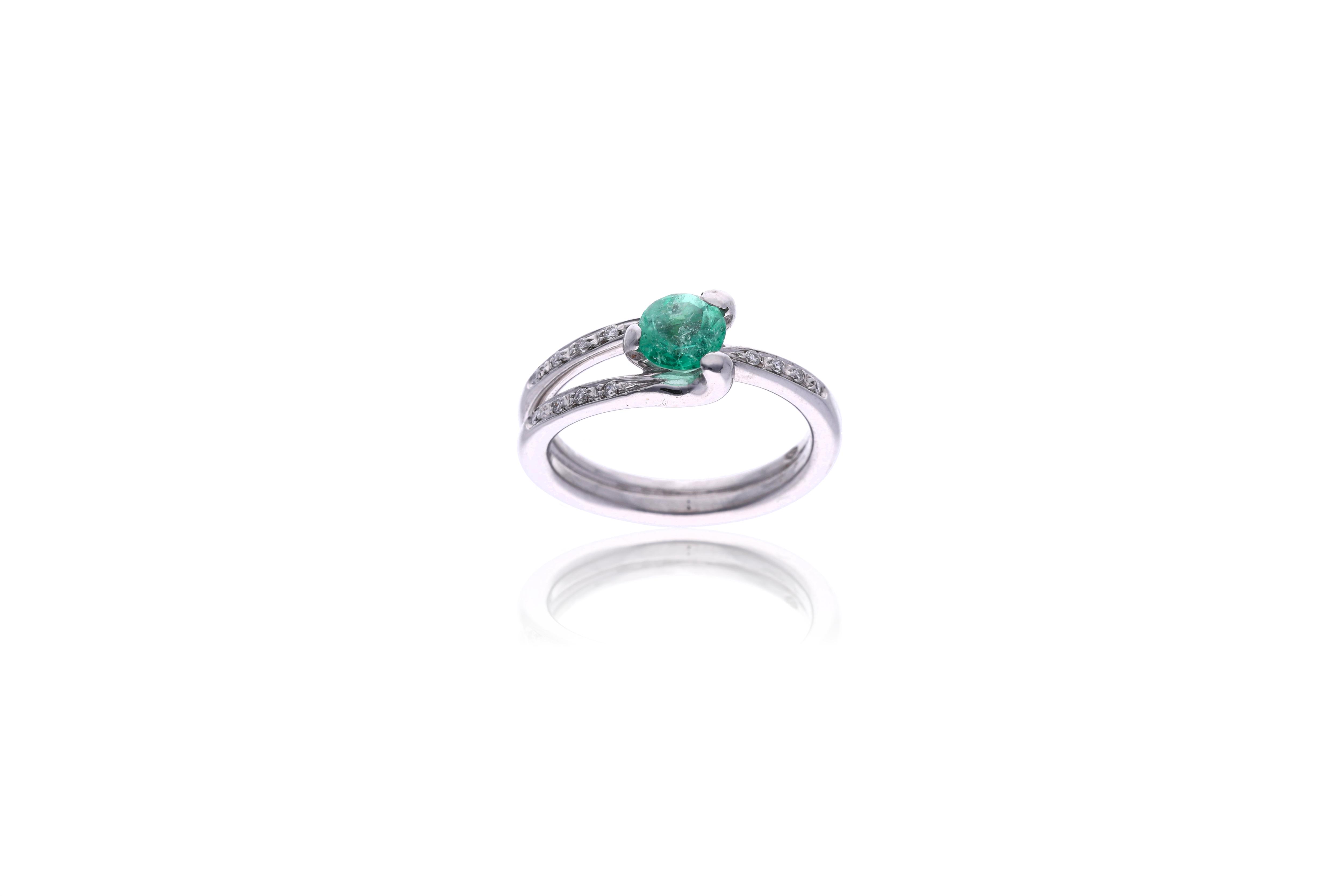 Anello con diamanti e smeraldo - Asta Preziosi