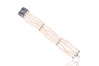 Bracciale formato da quattro fili di perle - Asta Tesoro Bracciale formato da quattro fili di perle - Asta Tesoro