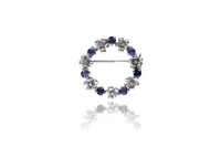 Spilla con diamanti e zaffiri - Asta Preziosi Spilla con diamanti e zaffiri - Asta Preziosi