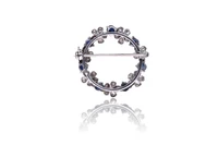 Spilla con diamanti e zaffiri - Asta Preziosi Spilla con diamanti e zaffiri - Asta Preziosi
