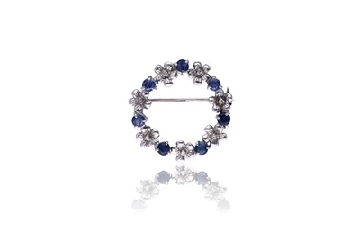 Spilla con diamanti e zaffiri - Asta Preziosi Spilla con diamanti e zaffiri - Asta Preziosi