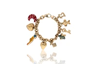 Bracciale con ciondoli in oro - Asta Preziosi Bracciale con ciondoli in oro - Asta Preziosi