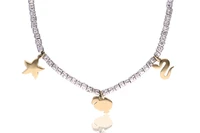Pomellato, Dodo, tre ciondoli in oro con collana in argento - Asta Preziosi