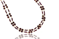 Collana in oro 750 con inserti in granato - Asta Preziosi