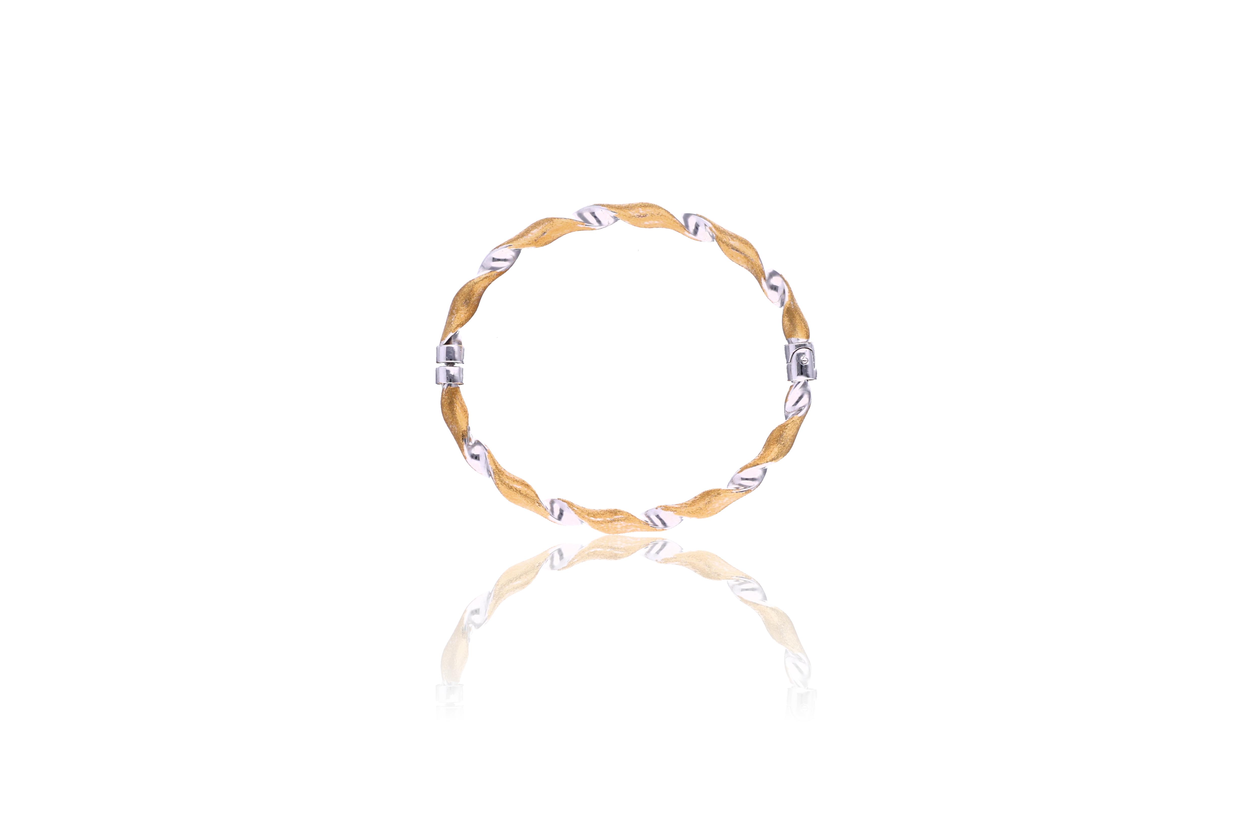 Bracciale in oro bicolore - Asta Preziosi